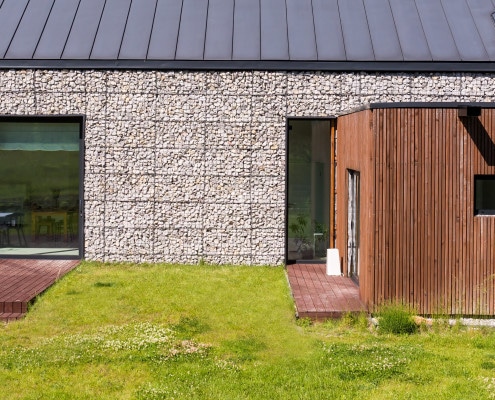 Extension en bois et maison en pierre : est-ce possible ?